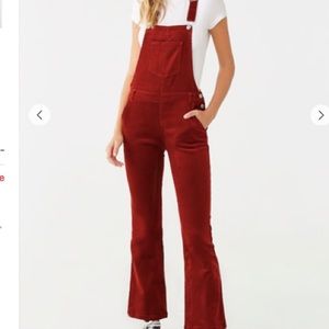 Red corduroy flare overalls
